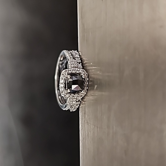 Black diamond ring w/ diamonds surrounding - Picture 4 of 8
